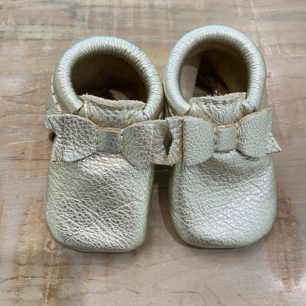 Freshly Picked baby girl metallic gold soft leather moccasins shoes with bow